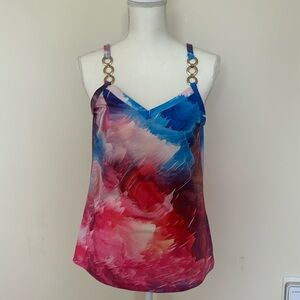 Bright multicolored tank top with three silver rings on front spaghetti strap